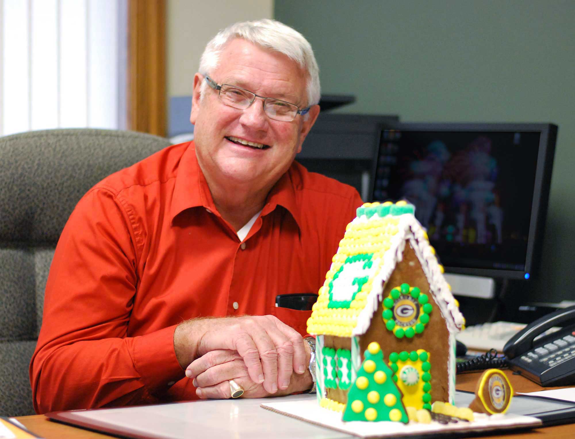 Howard Wiedenhoeft crafts gingerbread houses with detail and love.